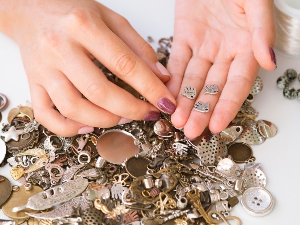 close up woman holding metallic accessories 23 2148264363