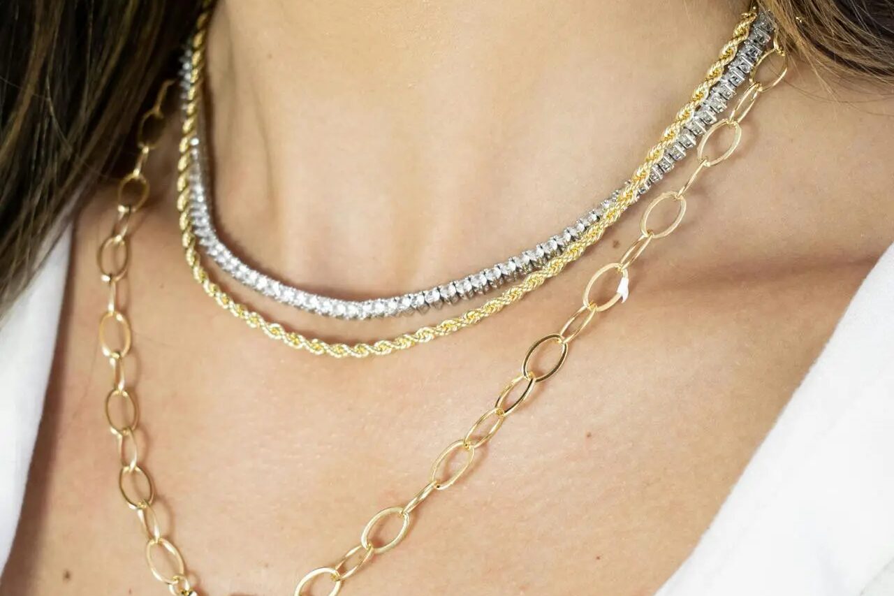 Layered gold rope and link chains, the kind of gold jewellery people bring to a Kelowna gold buyer